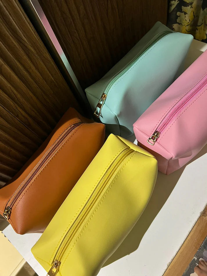 The Signature Monogram Pouch